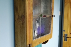 reclaimed stained glass window and pallet wood