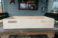 pull out kitchen cupboard storage solution made from plywood off cuts