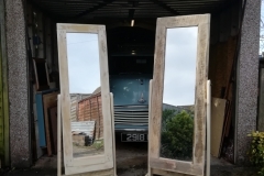 A pair of pallet wwood stand up mirrors